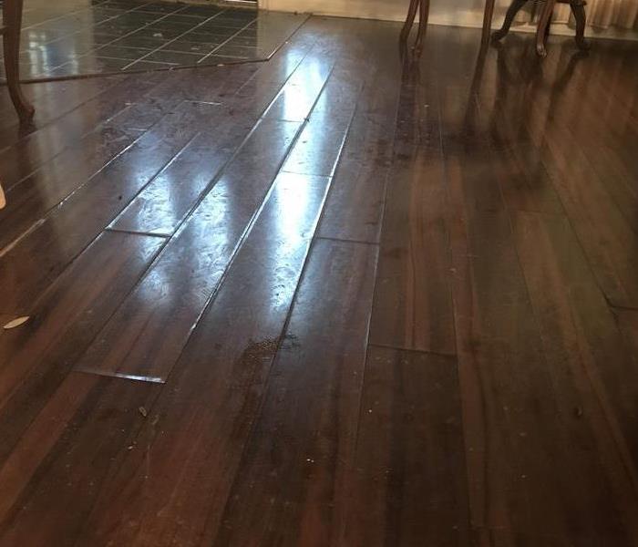 Damaged wood flooring.