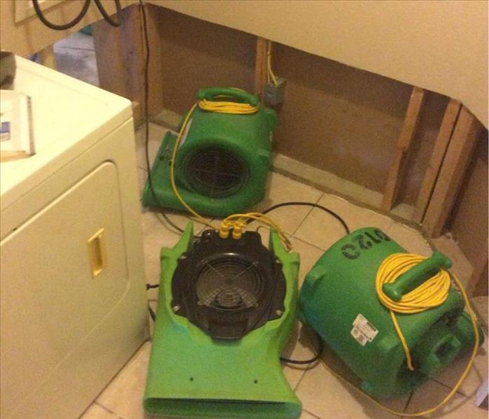 Drying equipment on floor.