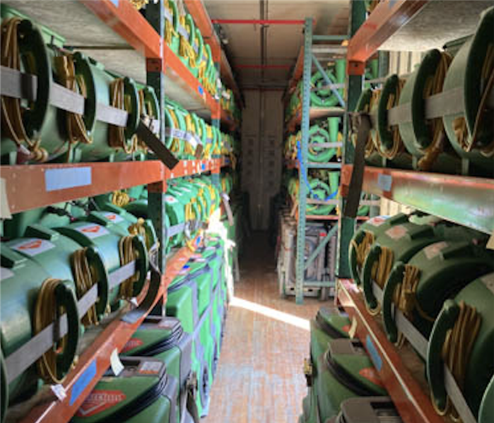 Interior trailer filled with drying equipment.