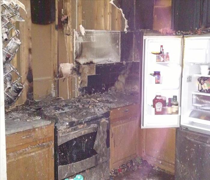 Fire damaged kitchen.