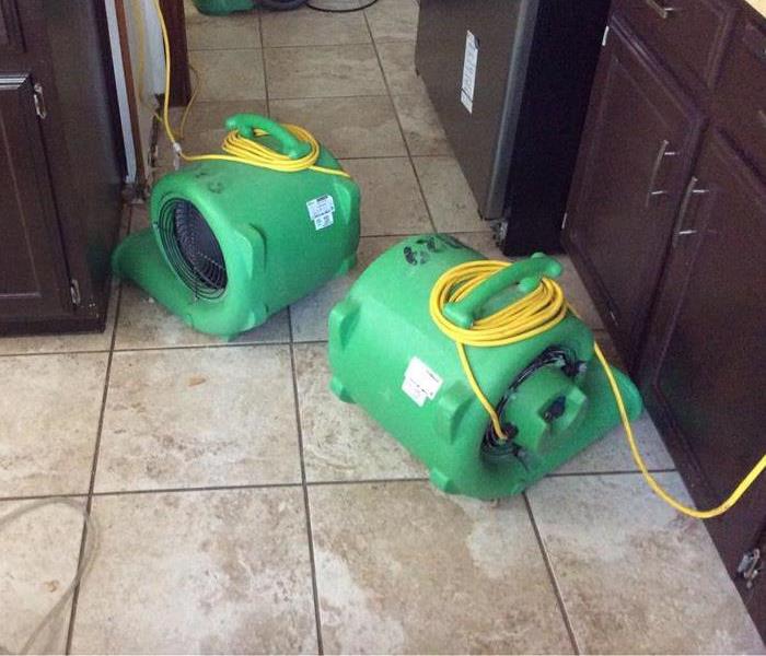 Drying equipment on floor.