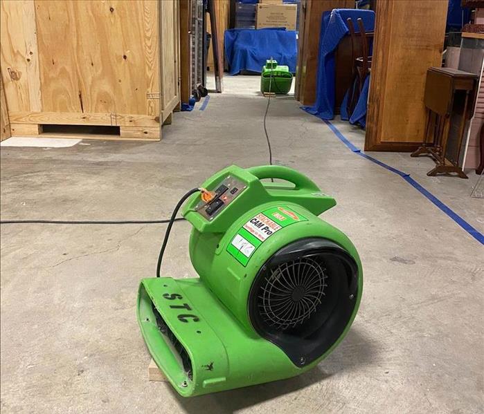 Drying equipment on floor.