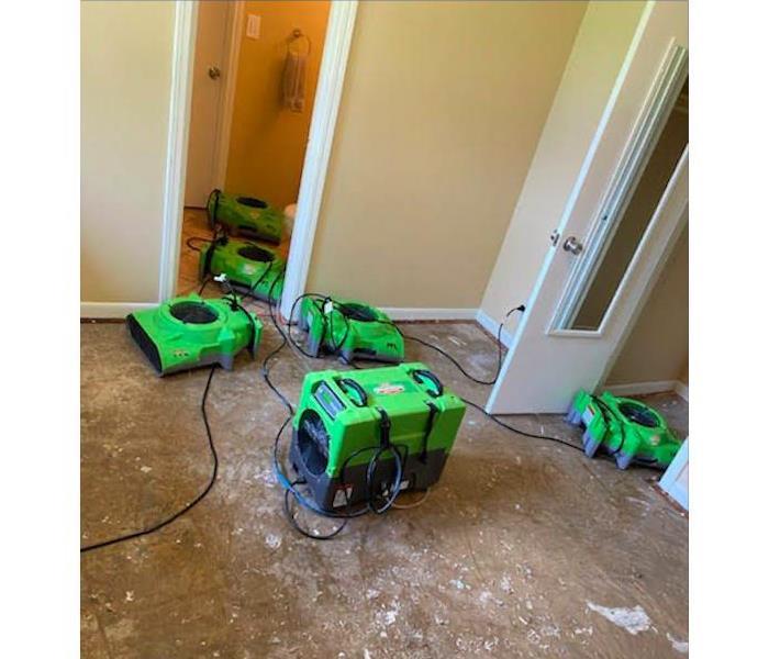 Drying equipment on floor.