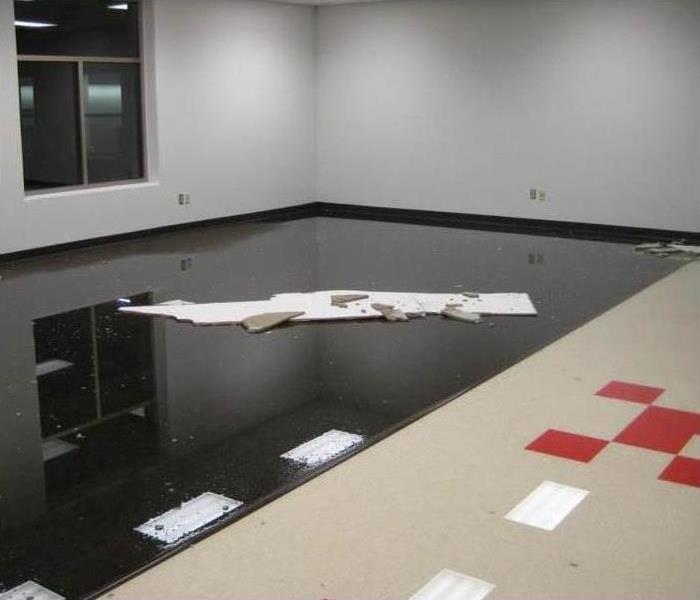 Commercial building, is empty but there is standing water in it
